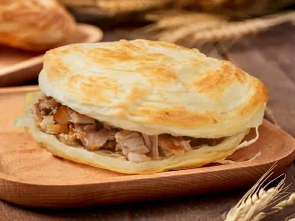 去哪里學(xué)做肉夾饃的技術(shù)？無經(jīng)驗也能學(xué)會，創(chuàng)業(yè)不再難！(圖2)